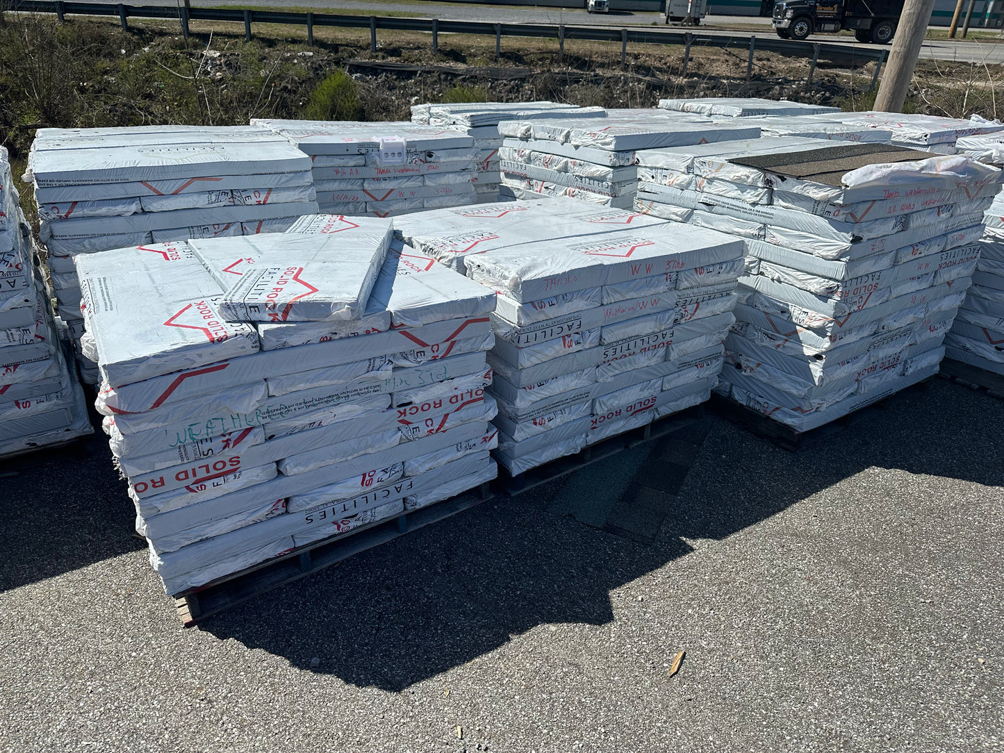 Pallets of roofing shingles