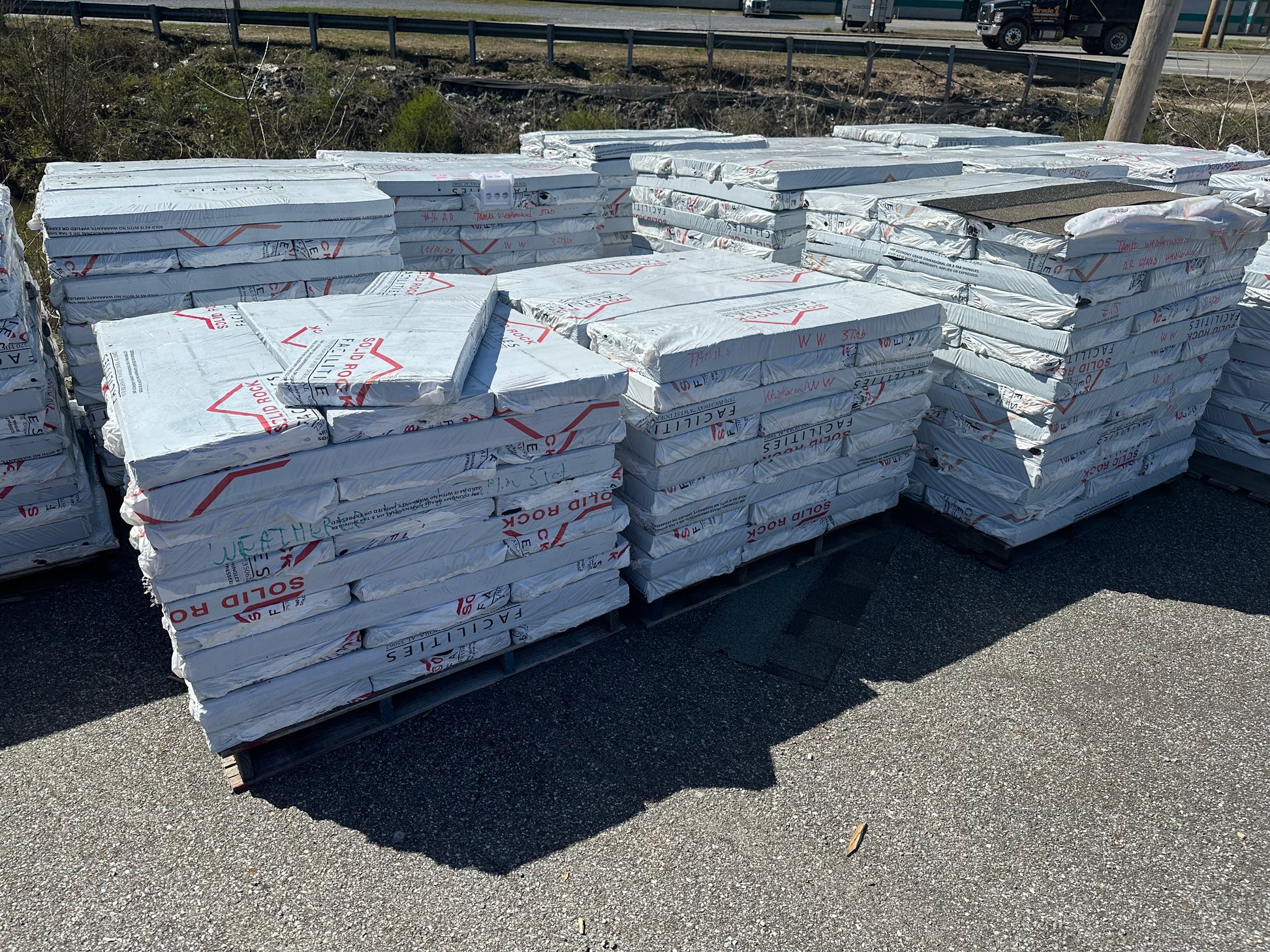 Pallets of roofing shingles