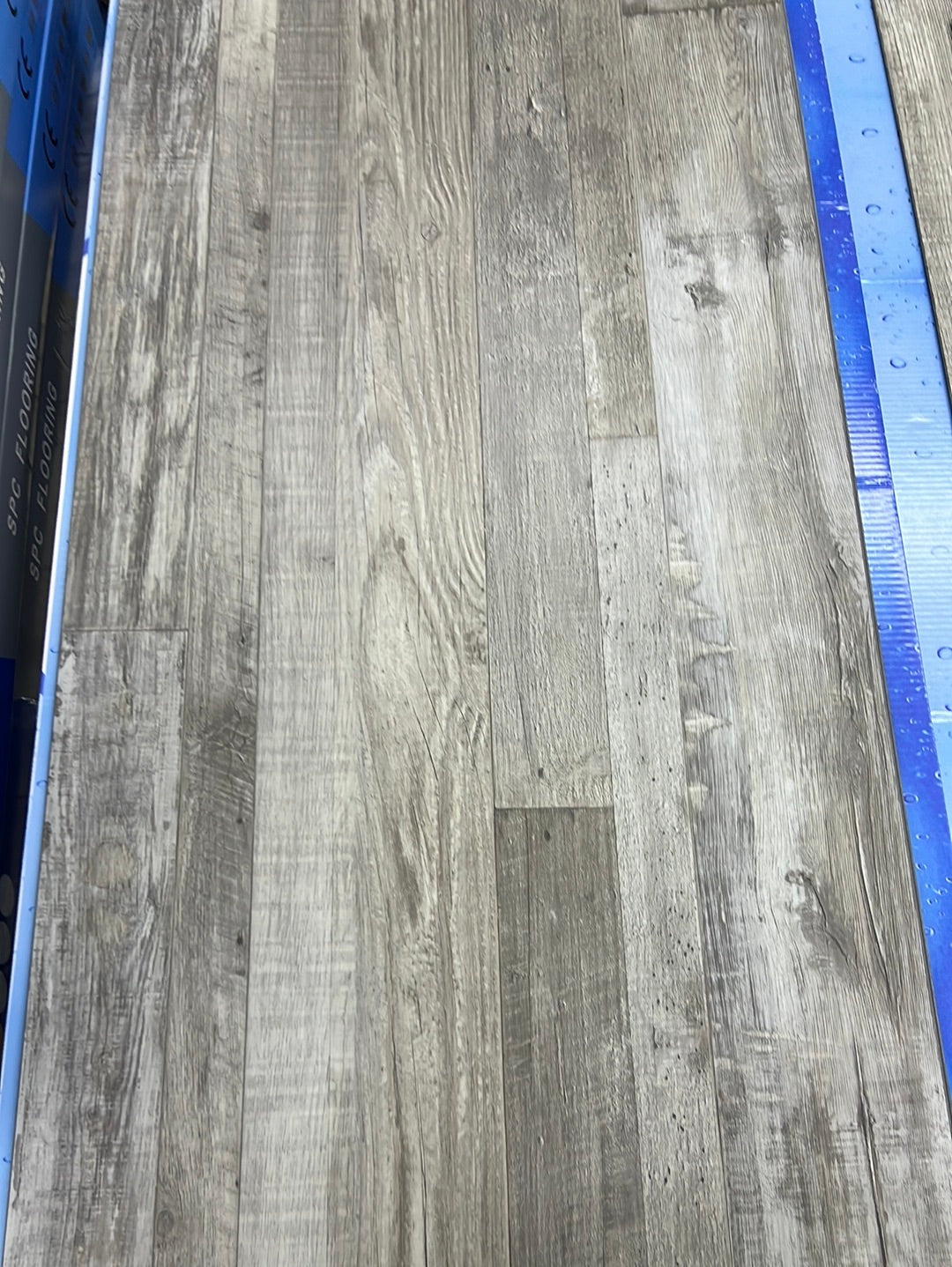 Planks of wood grain vinyl