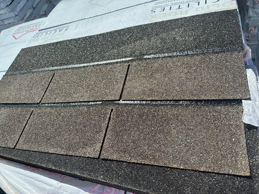 Dark roofing shingles