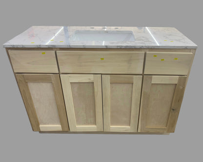 Wooden kitchen cabinet with marble countertop and sink on a gray background